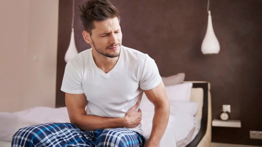 What causes urinary incontinence in men?